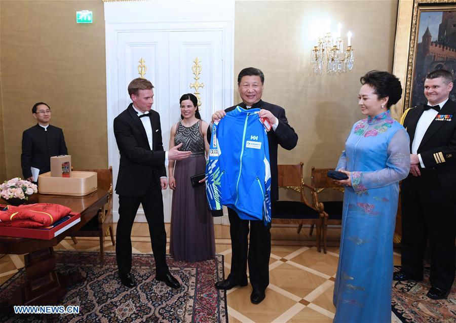 Chinese, Finnish presidents meet winter sports athletes