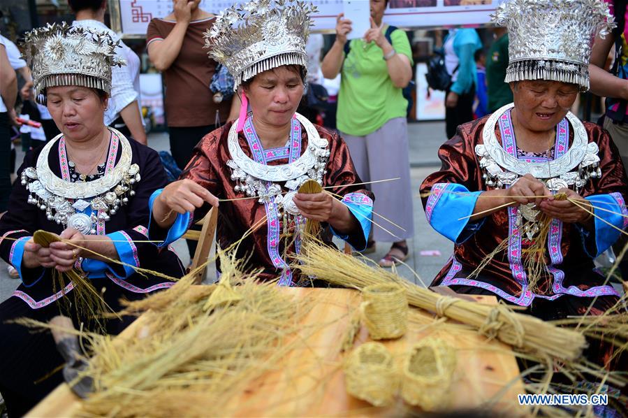 Traditional crafts presented during intangible cultural heritage show in Guangxi