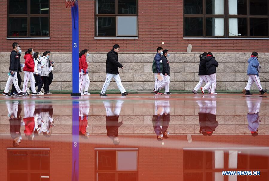 Students return to school for new semester in China