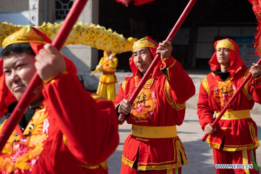 Villagers rehearse dragon and lion dance in Andi Village, Shanxi