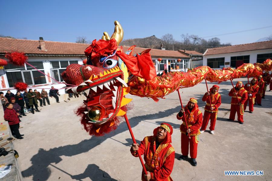 Villagers rehearse dragon and lion dance in Andi Village, Shanxi