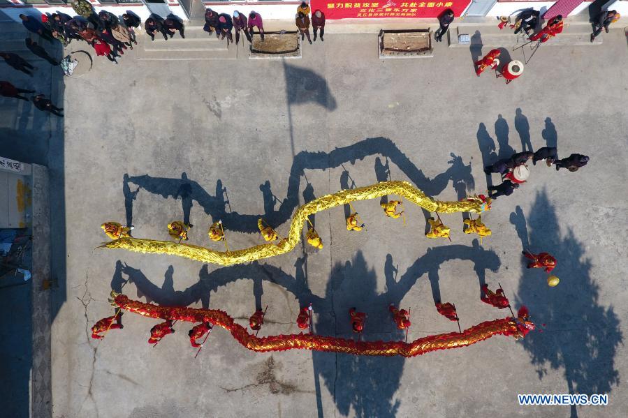 Villagers rehearse dragon and lion dance in Andi Village, Shanxi