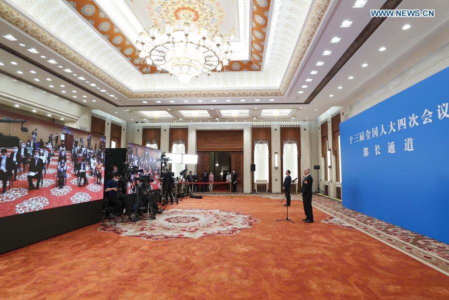 Ministers receive interview after 2nd plenary meeting of fourth session of 13th NPC