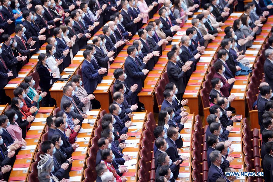 China's top legislature holds closing meeting of annual session