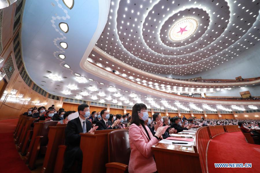 China's top legislature holds closing meeting of annual session