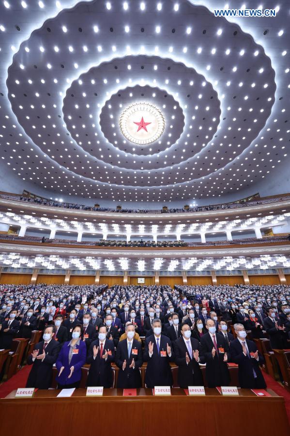 China's top legislature holds closing meeting of annual session