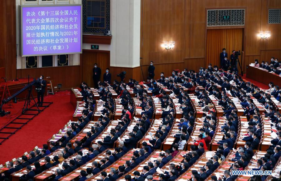 China's top legislature holds closing meeting of annual session