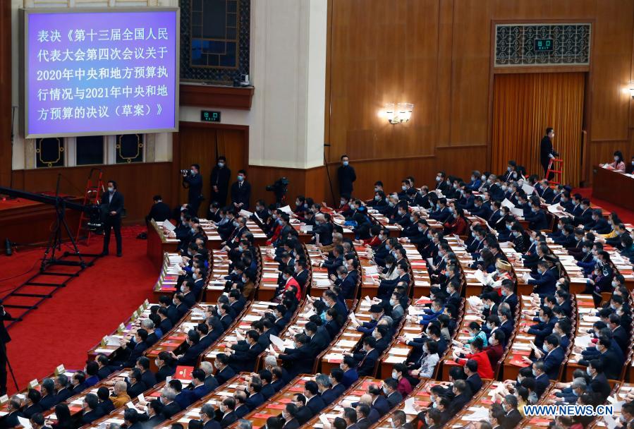 China's top legislature holds closing meeting of annual session