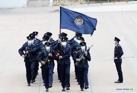 Hong Kong police march in Chinese-style goose-stepping on National Security Education Day