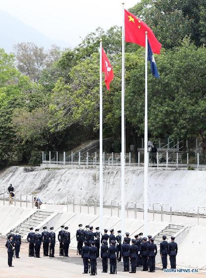 Hong Kong police march in Chinese-style goose-stepping on National Security Education Day