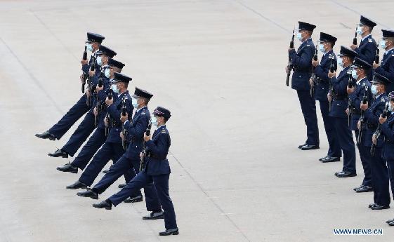 Hong Kong police march in Chinese-style goose-stepping on National Security Education Day