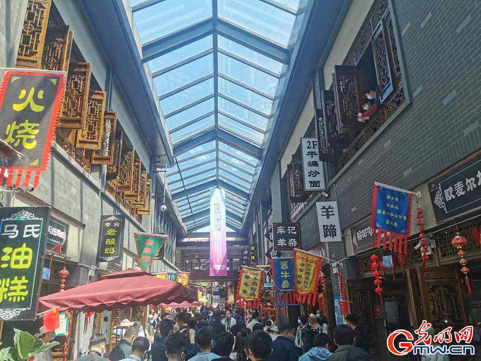 Too much to eat and enjoy at Kuanzhai Alley Food Street in Urumqi of Xinjiang