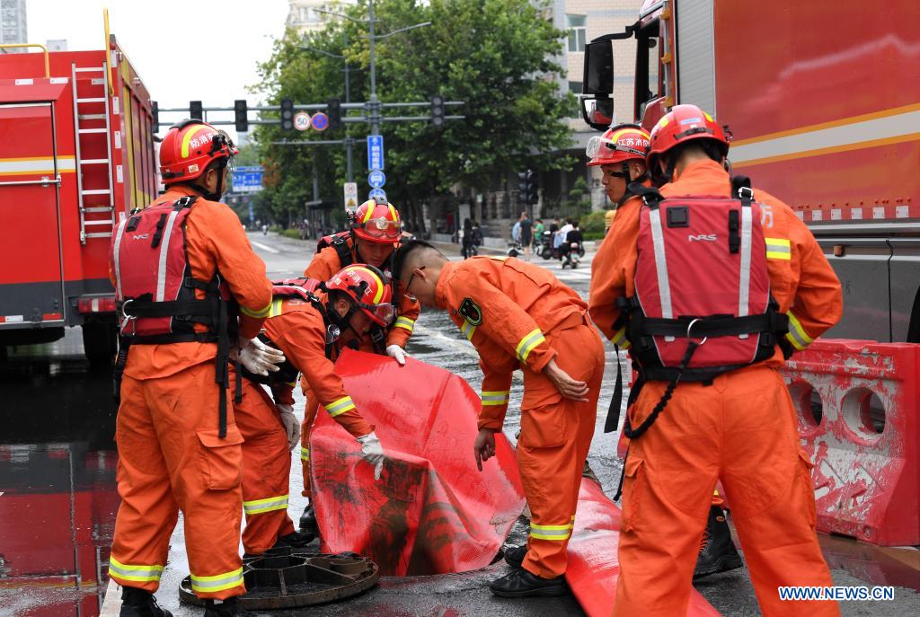 Rescue team of 1,800 firefighters deployed to flood-hit Henan from 7 neighboring provinces