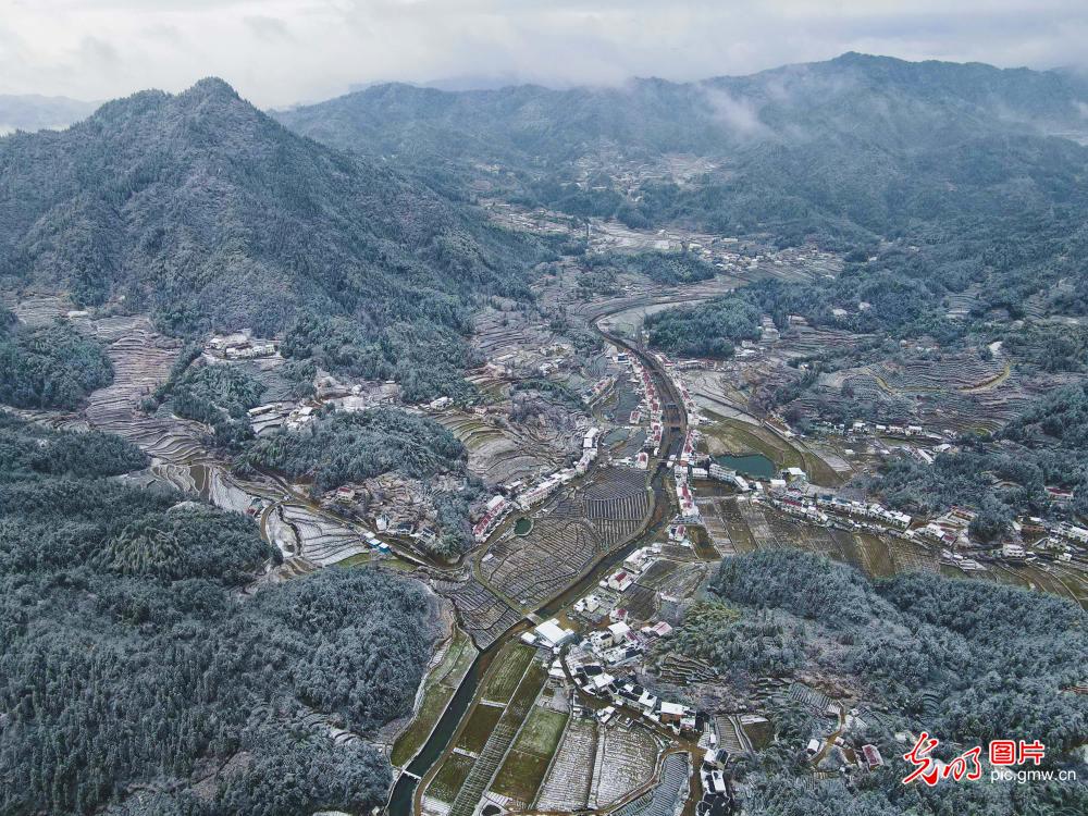 Snow cover mountainous village in E China's Anhui