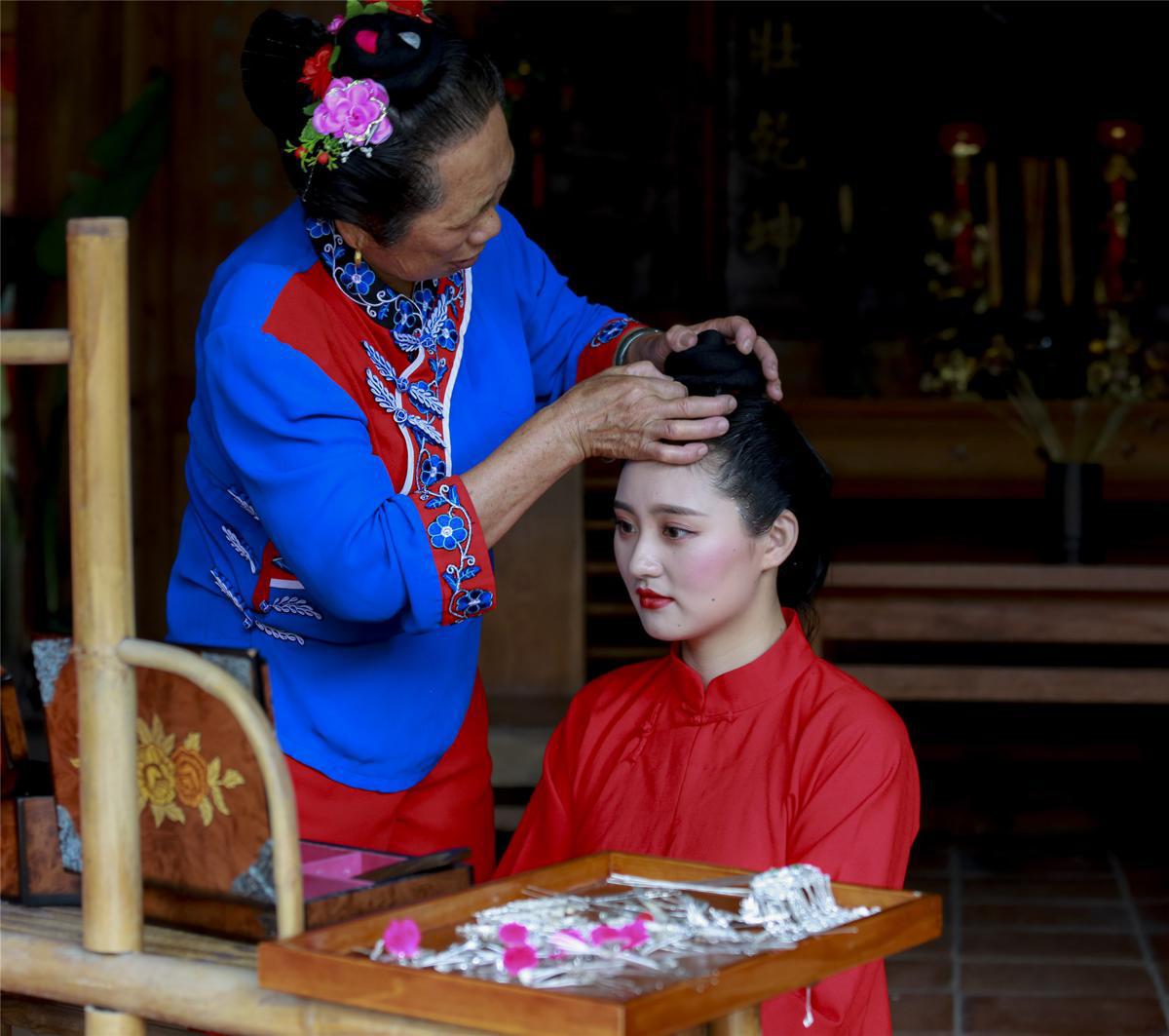 The symbolism behind Meizhou's Mazu chignon headdress