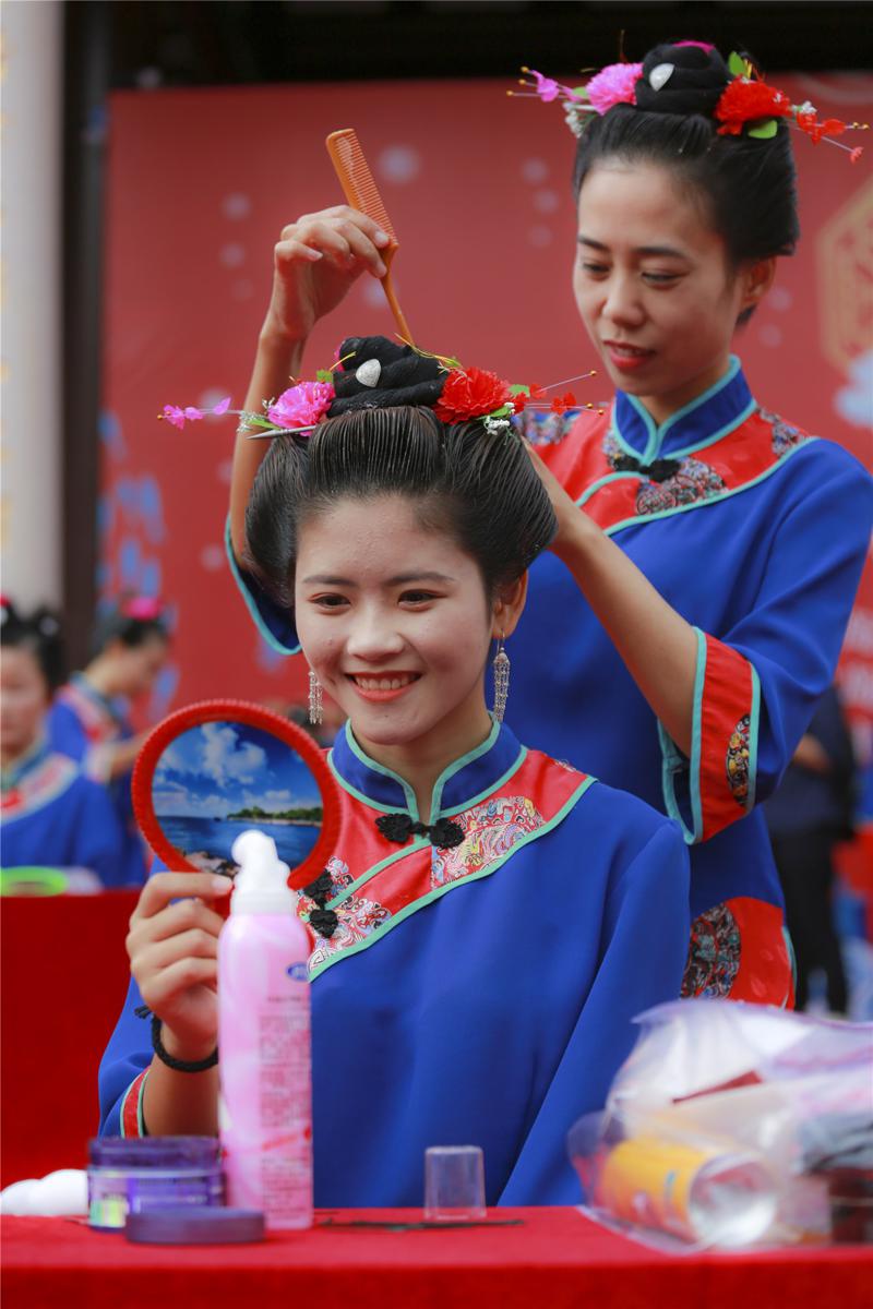 The symbolism behind Meizhou's Mazu chignon headdress