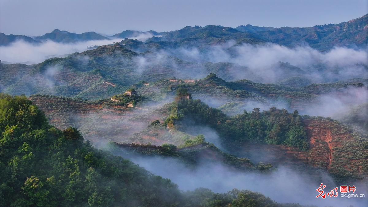 Picturesque scenery of the Great Wall with clouds