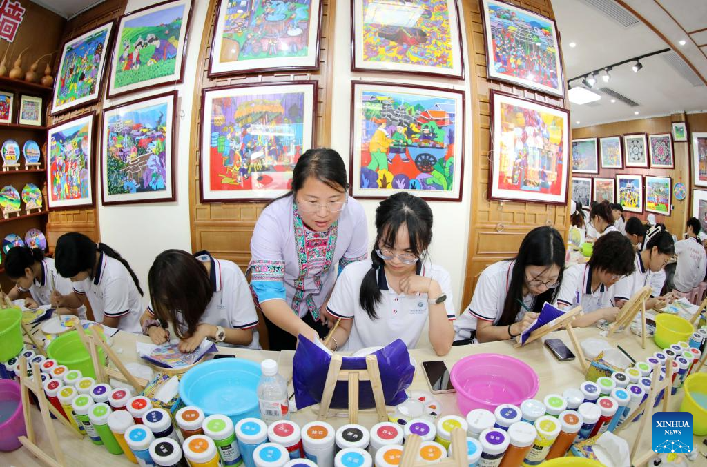 In pics: Sanjiang farmer painting in S China's Guangxi