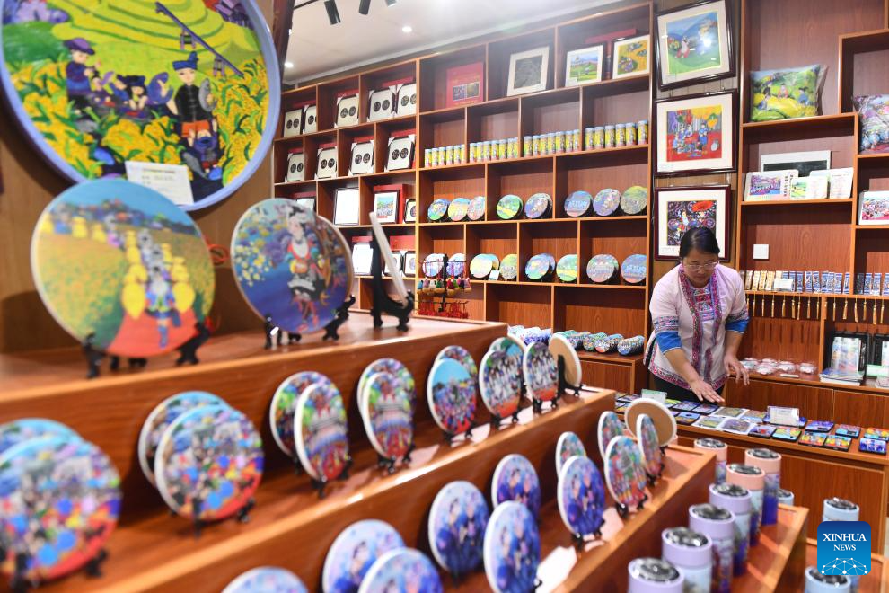 In pics: Sanjiang farmer painting in S China's Guangxi