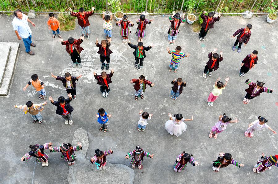 Teacher delivers hope to children in China's landlocked mountains