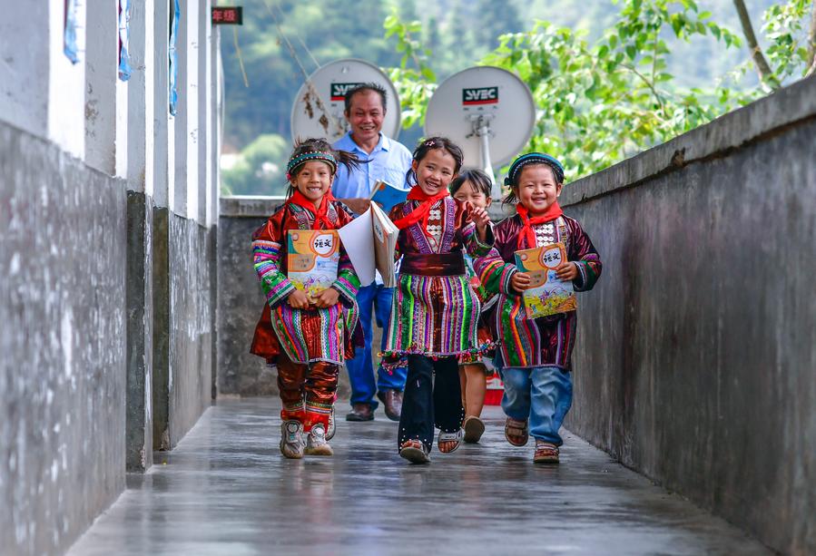 Teacher delivers hope to children in China's landlocked mountains