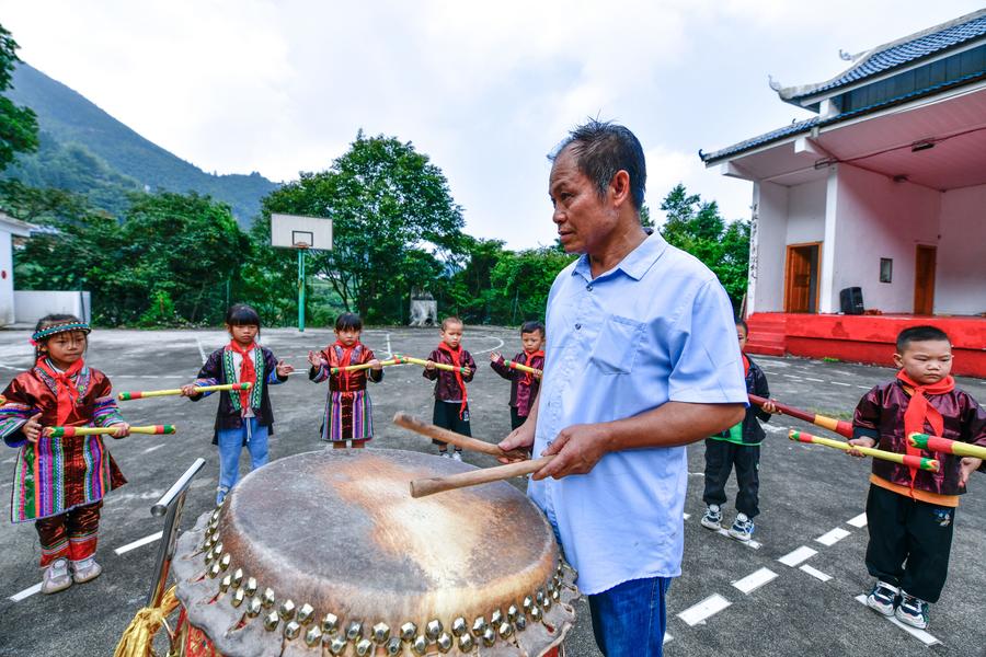 Teacher delivers hope to children in China's landlocked mountains