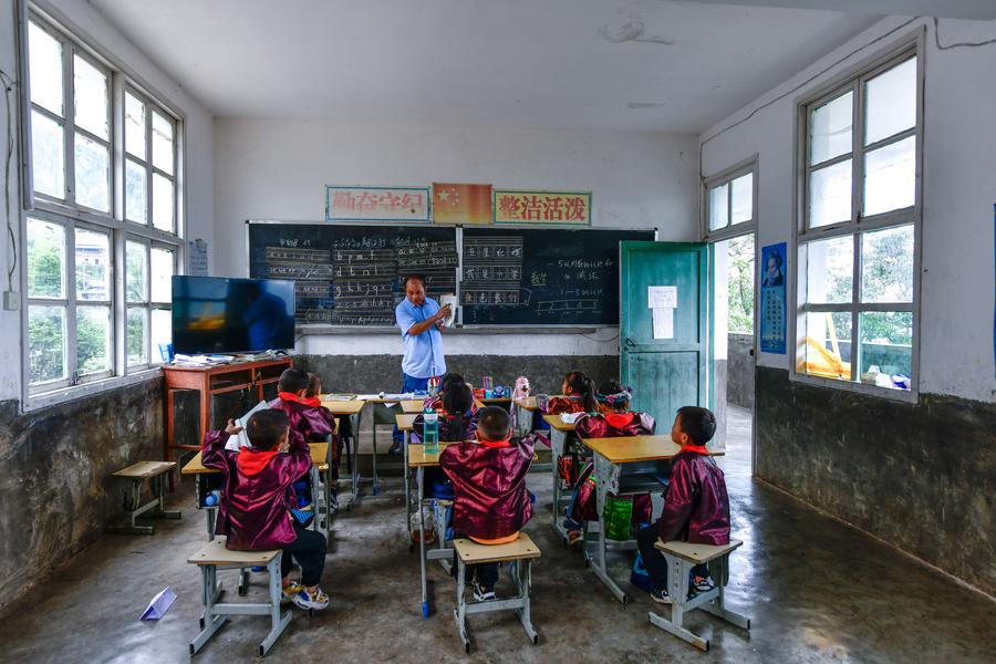 Teacher delivers hope to children in China's landlocked mountains