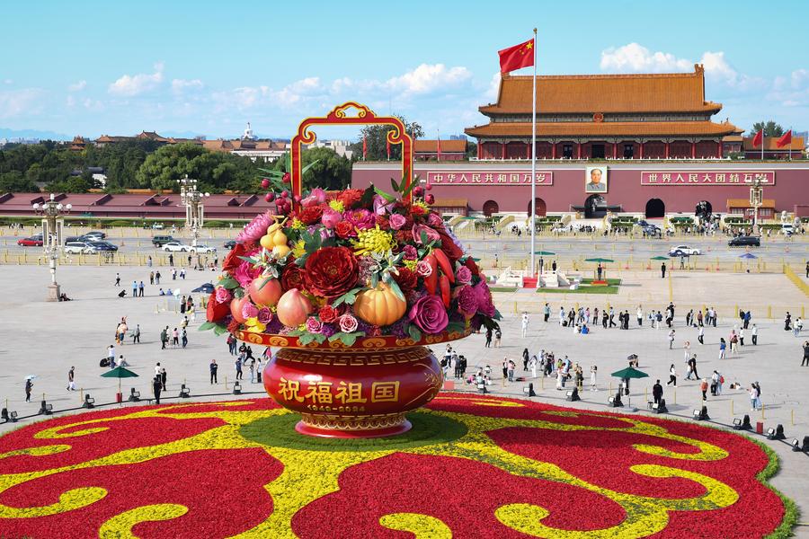 Experts, officials applaud Xi's pledge to promote peace and development in National Day speech