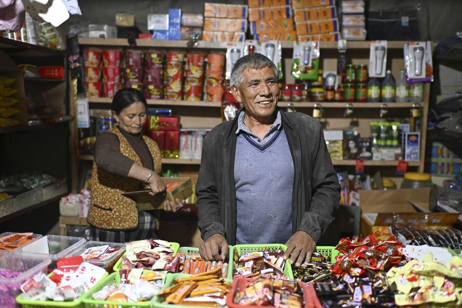 InPics: Relocated villagers in NW China's Xinjiang embrace better life