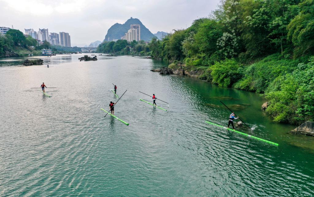 Single bamboo drifing team from Guangxi shines at the 12th National Traditional Games of Ethnic Minorities of China