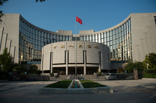 China's central bank suspends treasury bond purchases