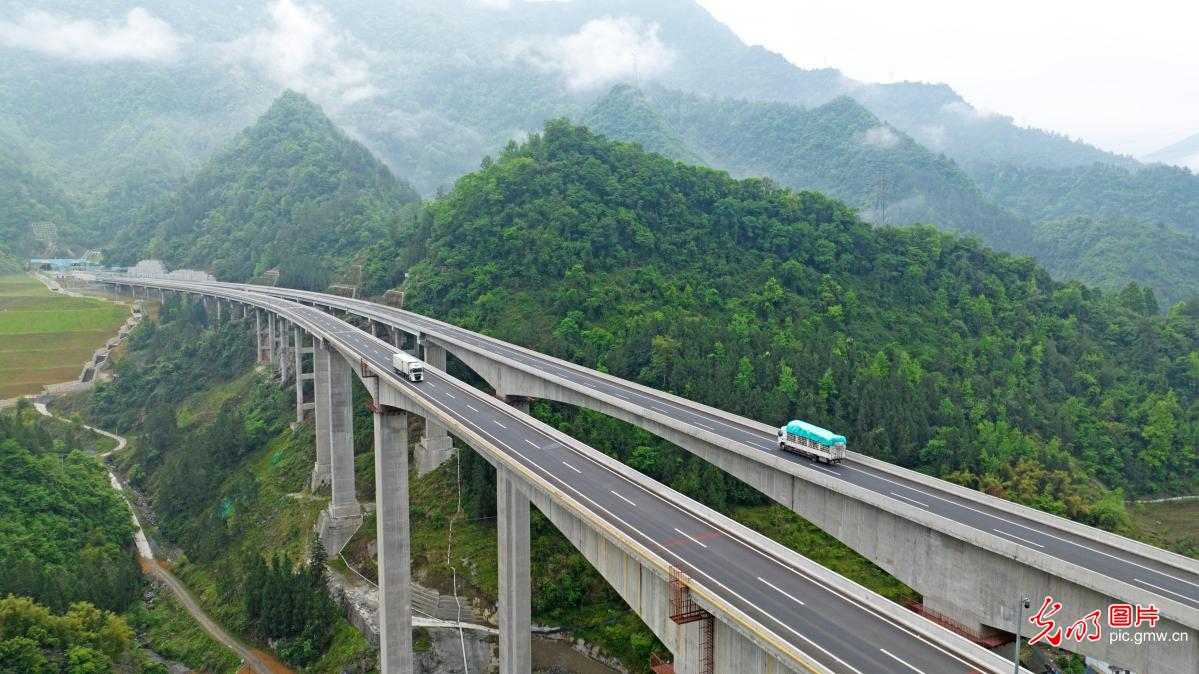 Engineering artwork of mountain bridge in SW China's Guizhou