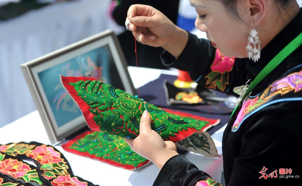 Miao embroiderers compete in SW China's Guizhou