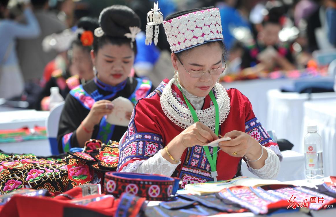 Miao embroiderers compete in SW China's Guizhou