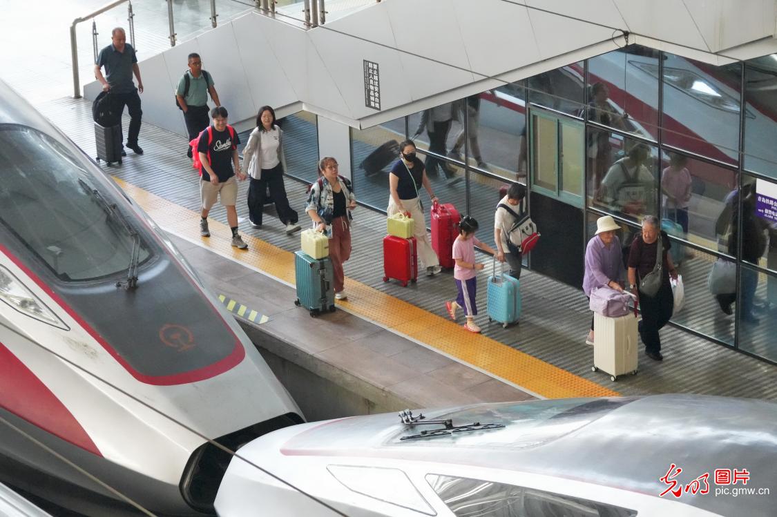 Summer railway travel rush kicks off as new train operation plan takes effect across China