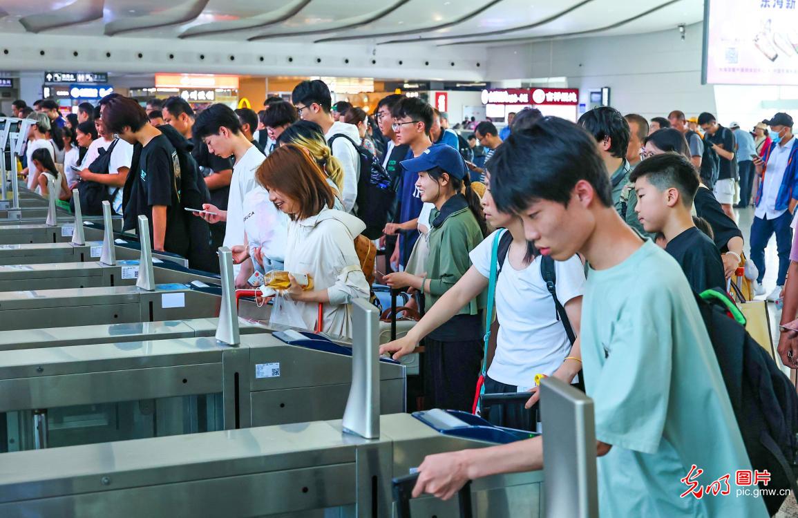 Summer railway travel rush kicks off as new train operation plan takes effect across China