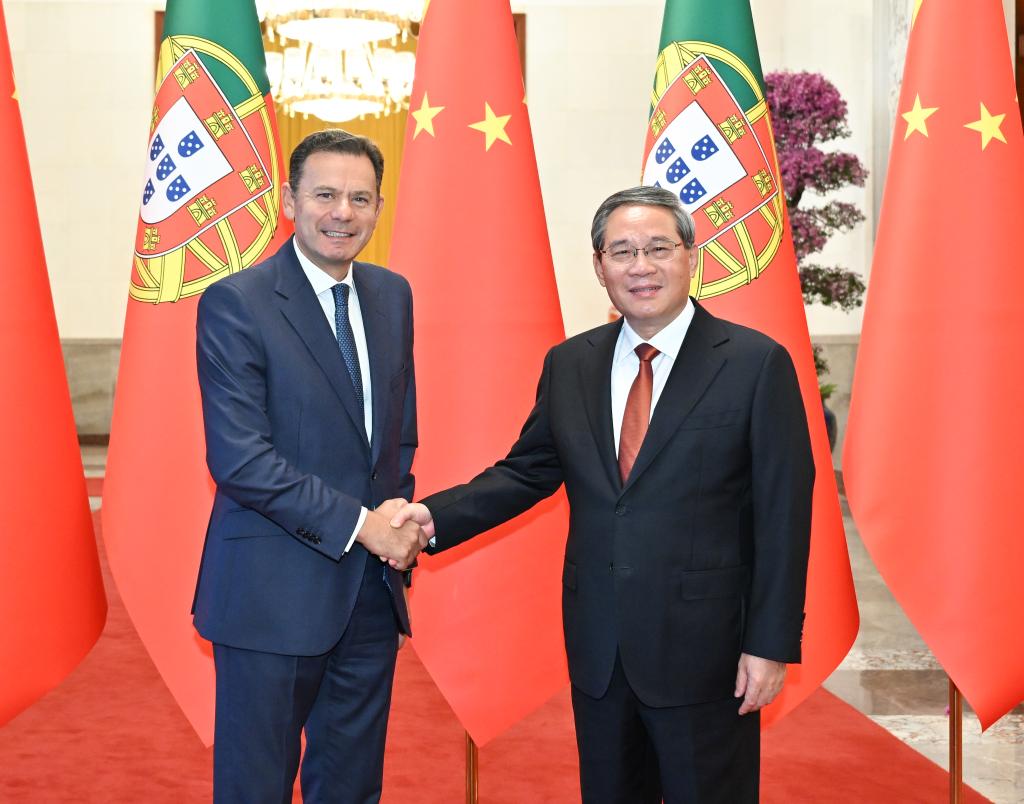 China, Portugal pledge to enhance cooperation, safeguard free trade