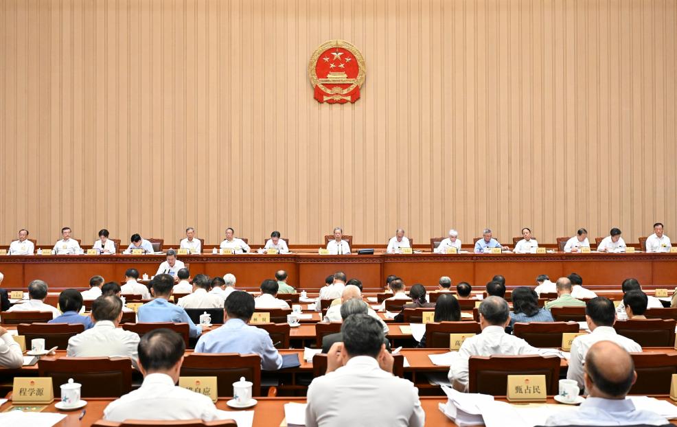 Chinese lawmakers hear reports at NPC standing committee session