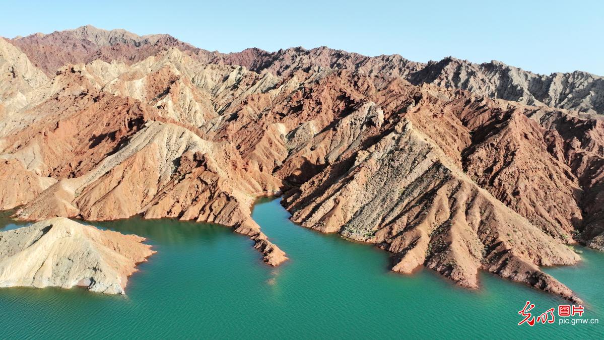Danxia landform reflections paint stunning scene in NW China's Gansu Danxia landform reflections paint stunning scene in NW China's Gansu