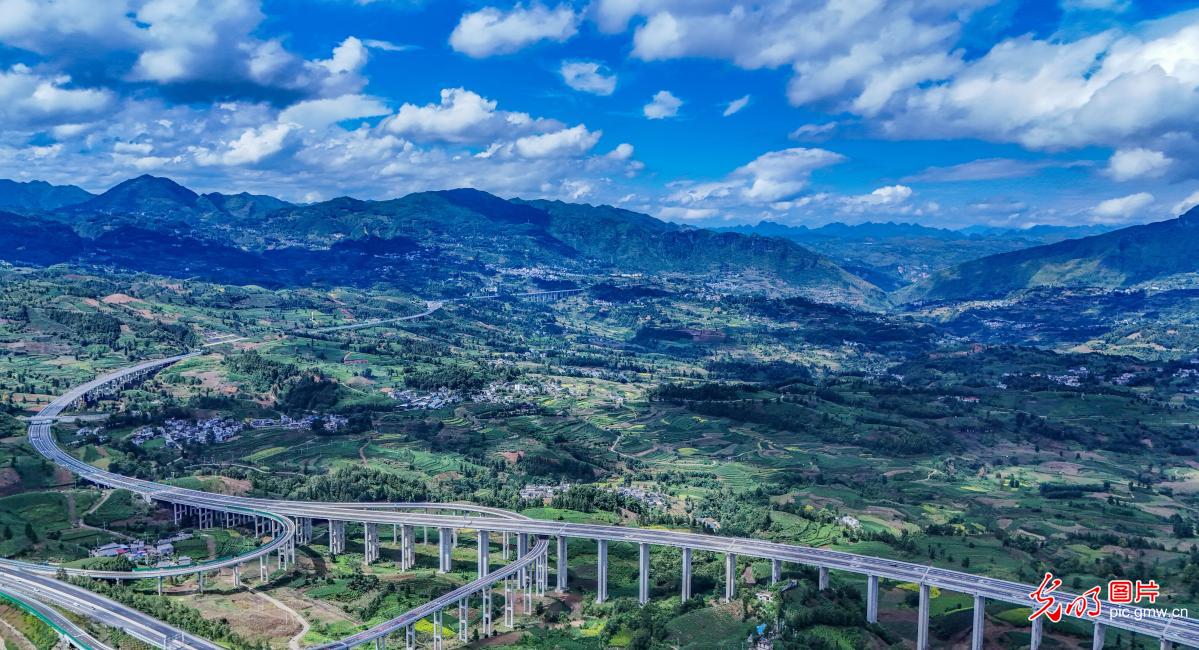 Expressway weaves through tea mountains and villages in SW China's Guizhou Expressway weaves through tea mountains and villages in SW China's Guizhou