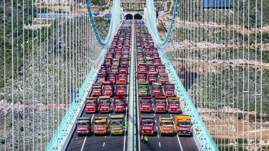 World's highest bridge opens to traffic in China's mountainous southwest