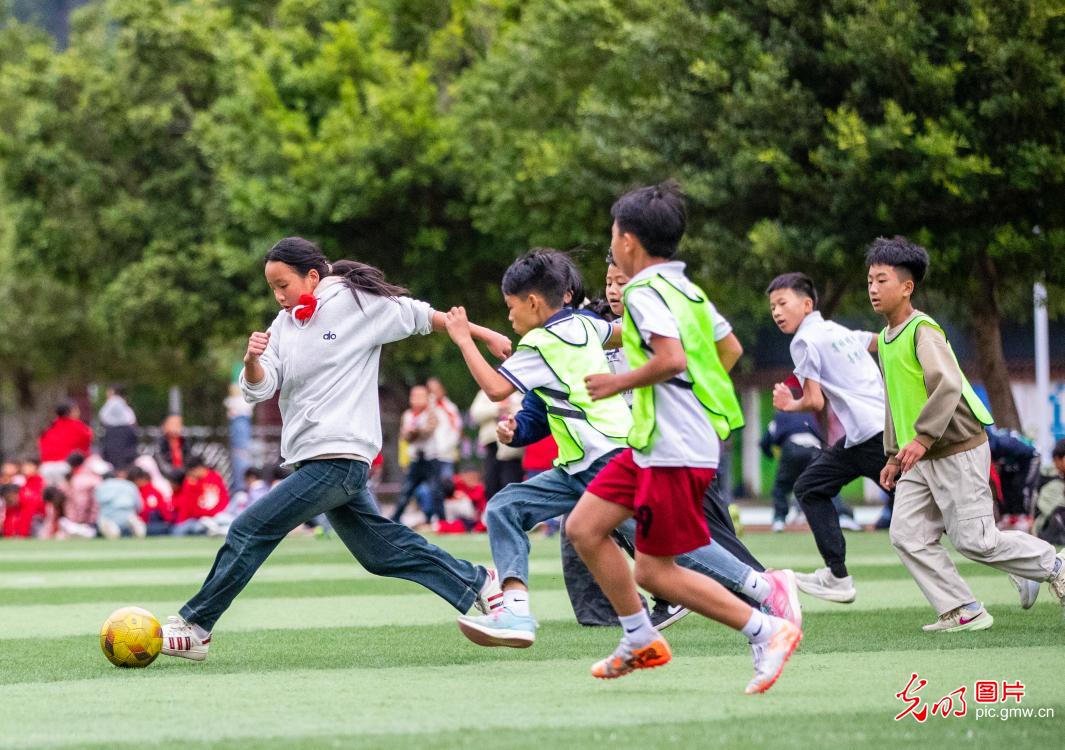 Young players practice football in SW China's Guizhou Young players practice football in SW China's Guizhou