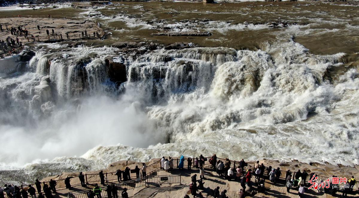 Frozen waterfall creates winter spectacle at Yellow River