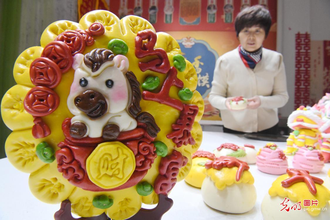 Festive dough figurines welcome New Year across China