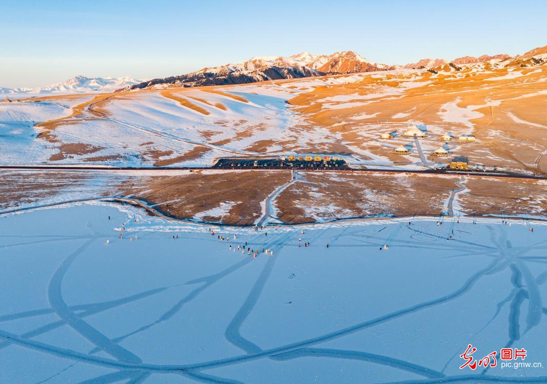 Snowy scenery highlights winter charm of Sayram Lake in NW China's Xinjiang Snowy scenery highlights winter charm of Sayram Lake in NW China's Xinjiang