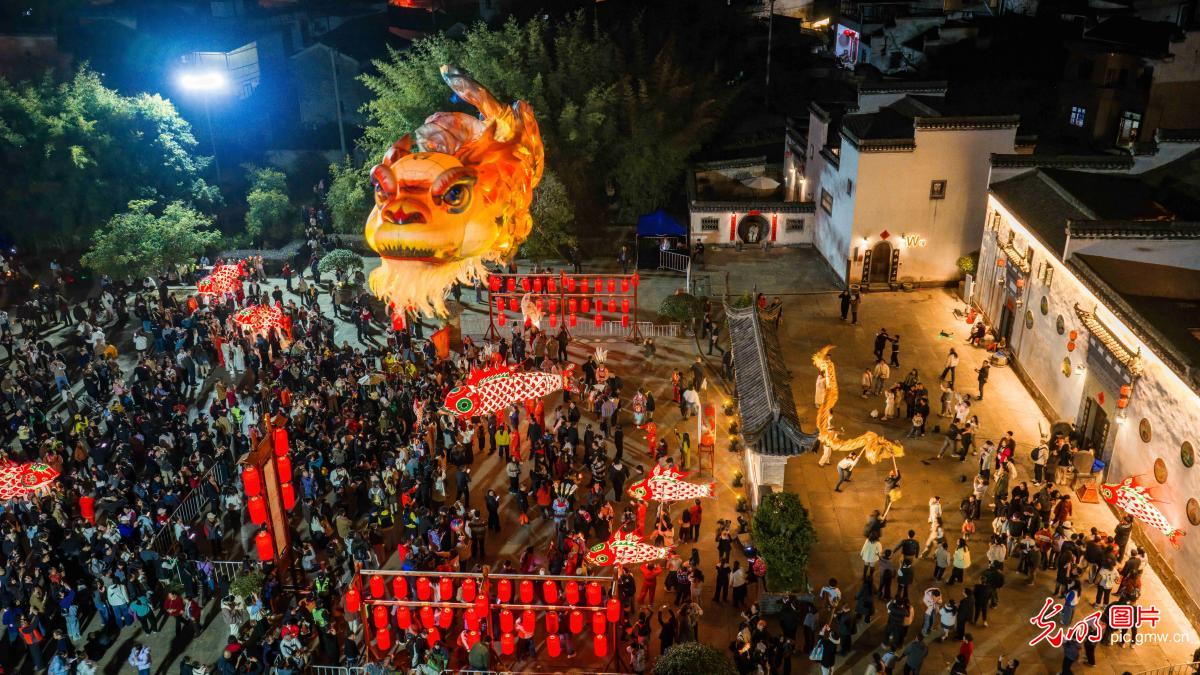 Ancient village fish lantern parade staged in E China's Anhui