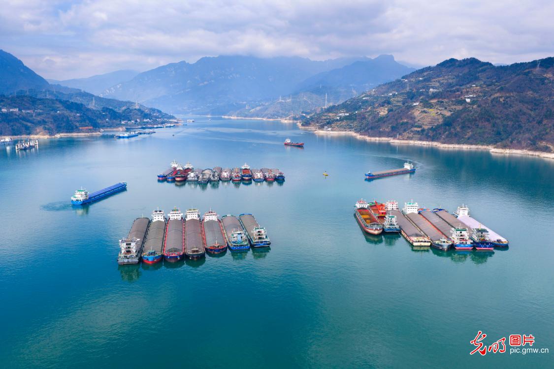 Ships gather at lock anchorage upstream of Three Gorges Dam in central China