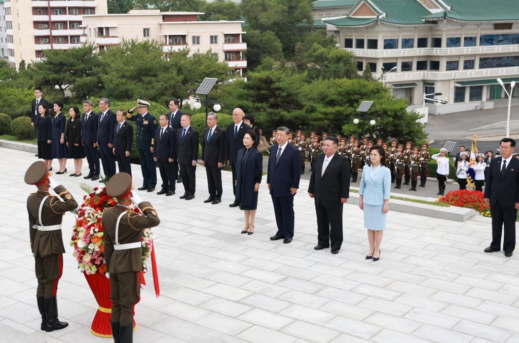 Xi, Kim pledge to carry forward great traditional China-DPRK friendship through generations