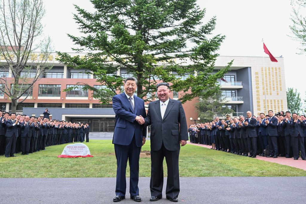 Xi, Kim pledge to carry forward great traditional China-DPRK friendship through generations