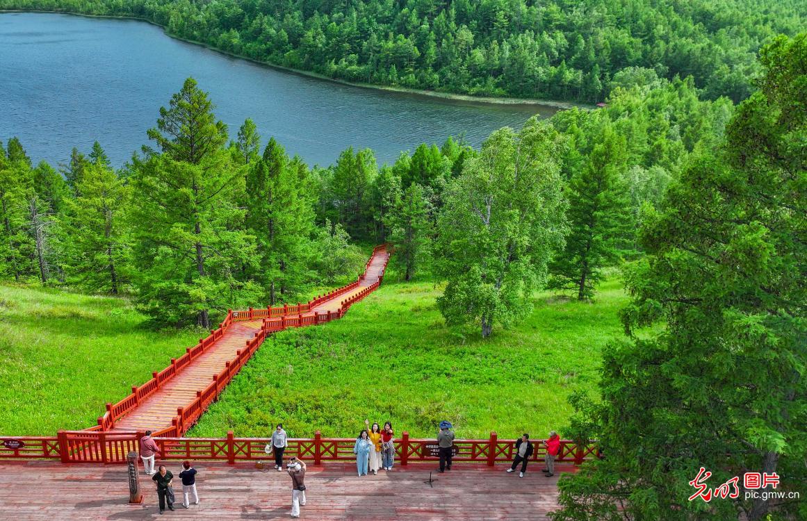 Scenic lakes and mountains form ecological gallery in N China
